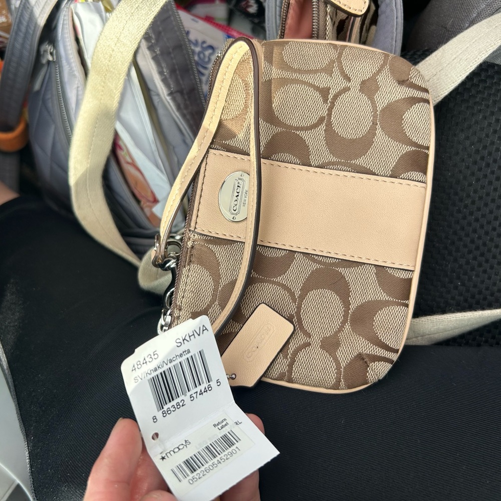 Coach crossbody and matching leather wristlet for sale. Selling as a set